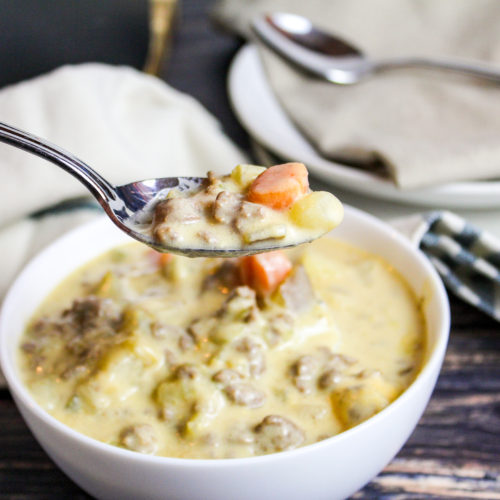 cheeseburger soup in a white bowl