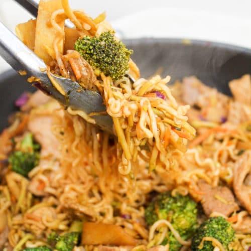 pork stir fry with tongs
