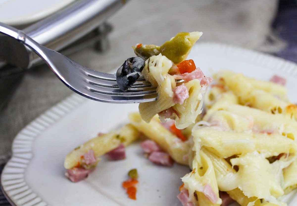 muffaletta casserole on a fork