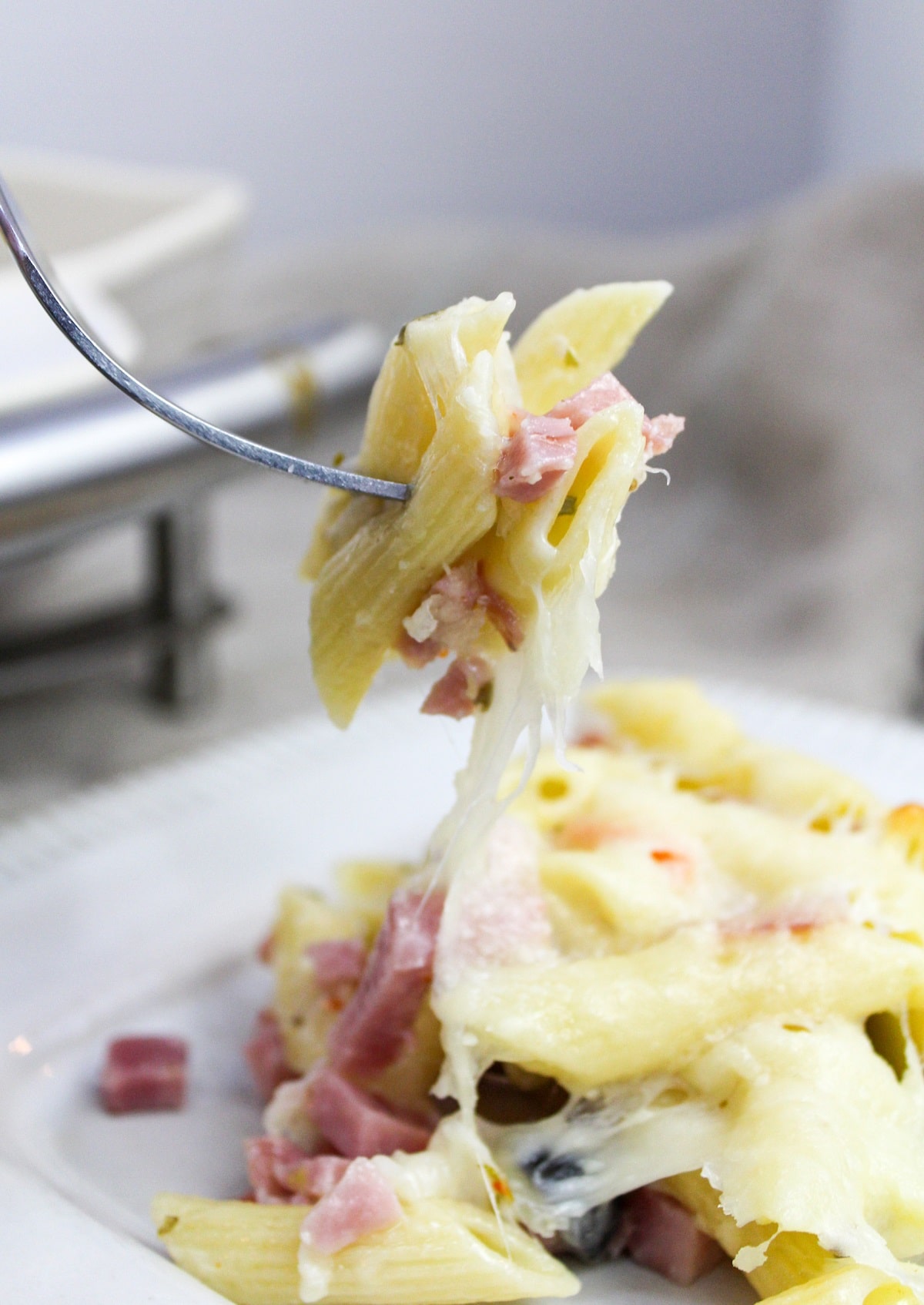 muffaletta casserole on a fork
