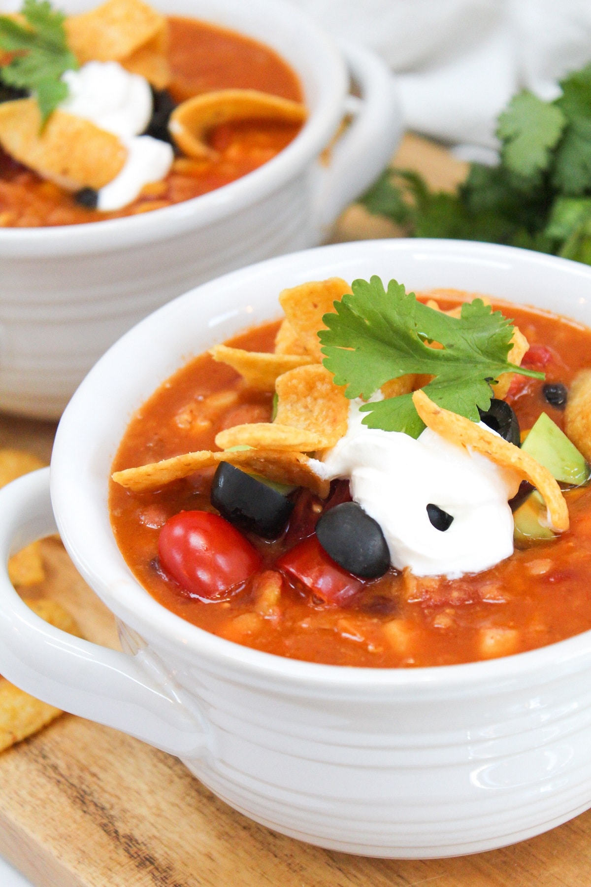instant pot vegetarian lentil tortilla soup in a white bowl