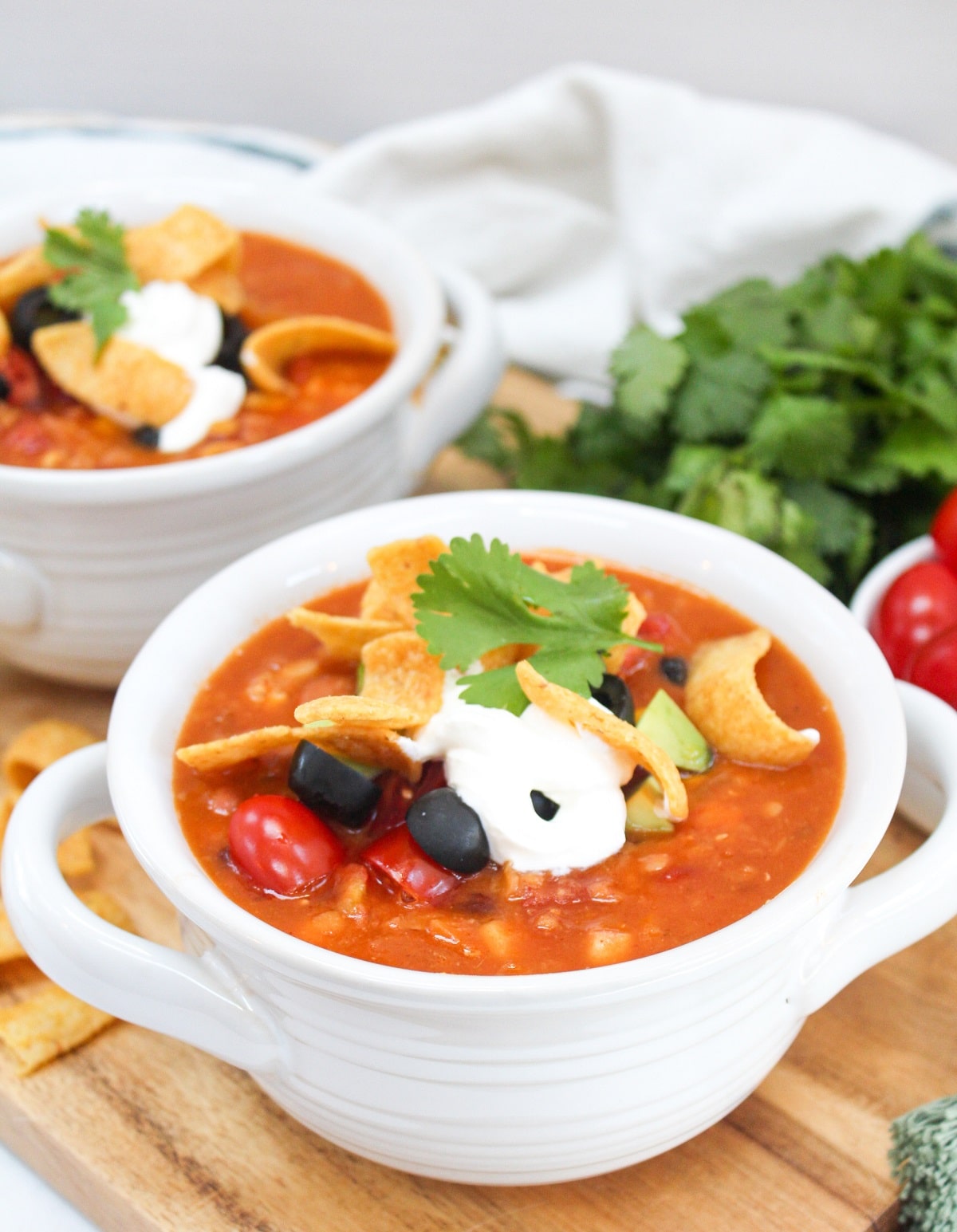 instant pot vegetarian lentil tortilla soup in a white bowl