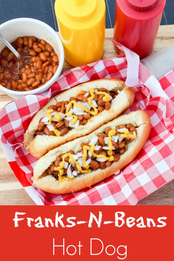 hot dog on the bun with beans and onion