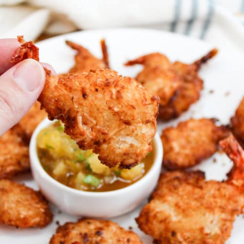 shrimp held in a hand