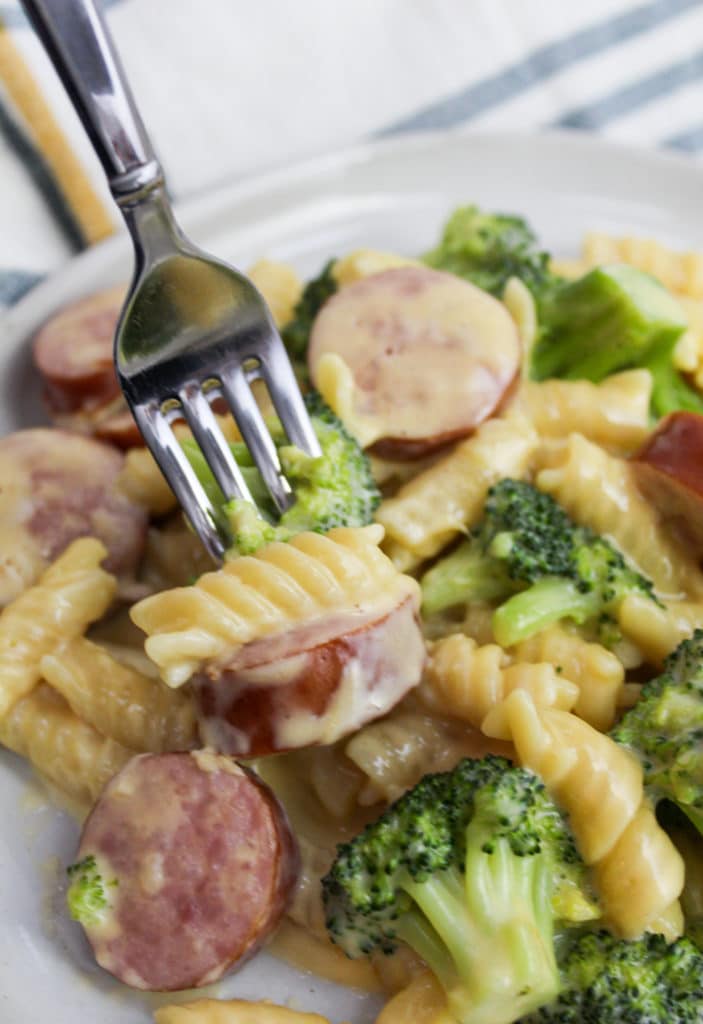 pasta scooped from a bowl with a fork
