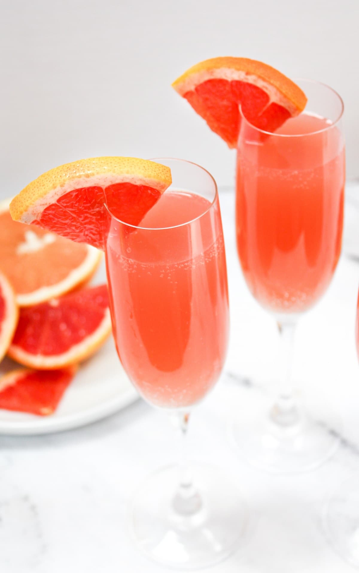 rose mimosa with citrus fruit in the background