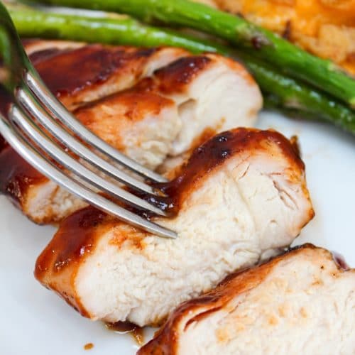 grilled bbq chicken on a fork
