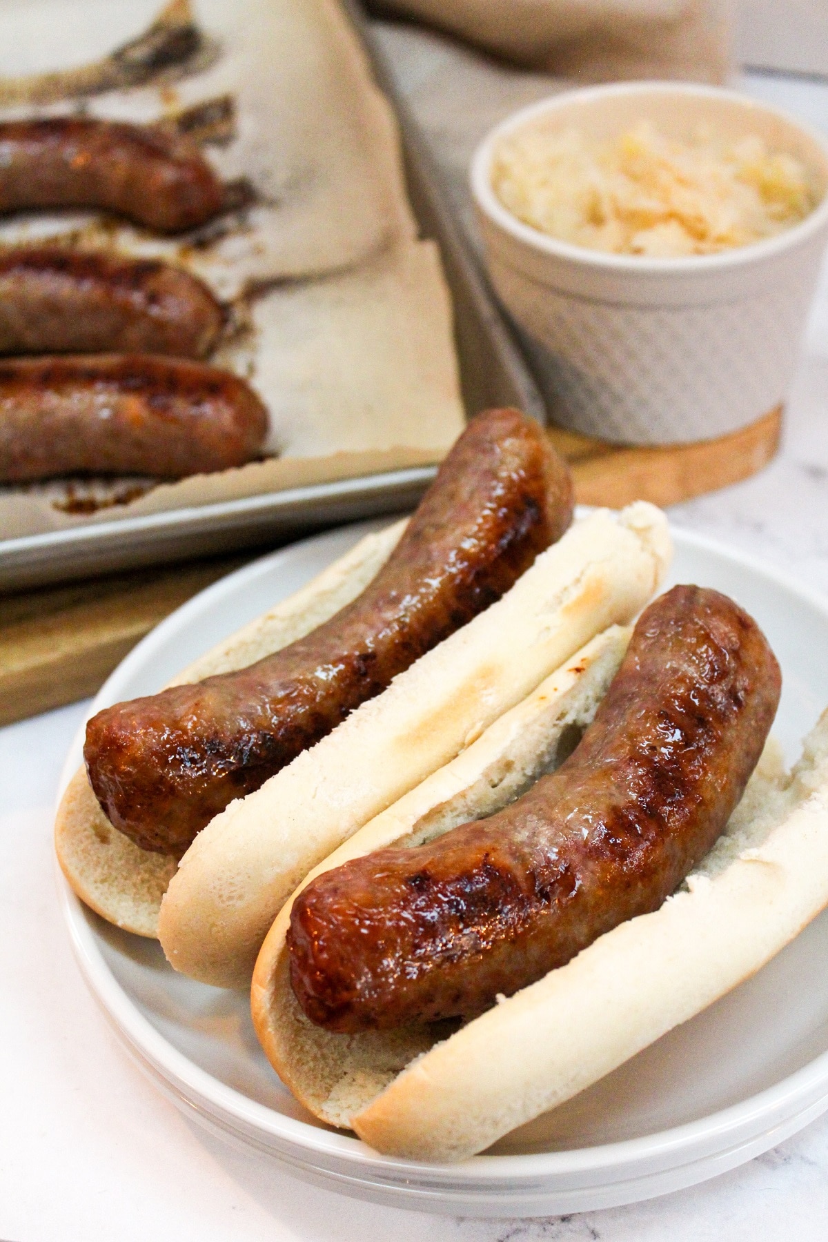 two brats in buns