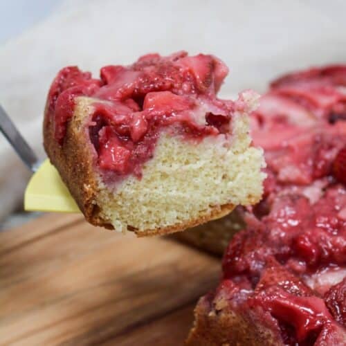 Slice of cake taken from pan with a spatula.